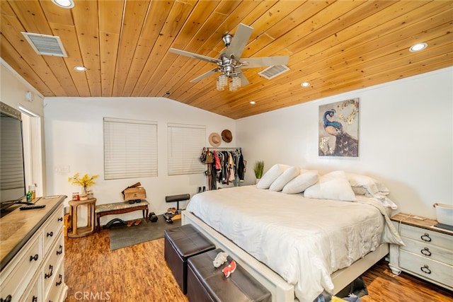 bedroom with ceiling fan, wood ceiling, hardwood / wood-style floors, and vaulted ceiling