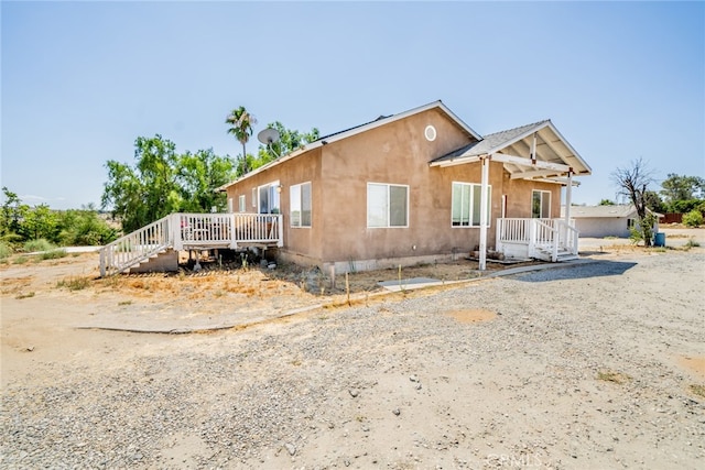 view of front of home featuring a deck