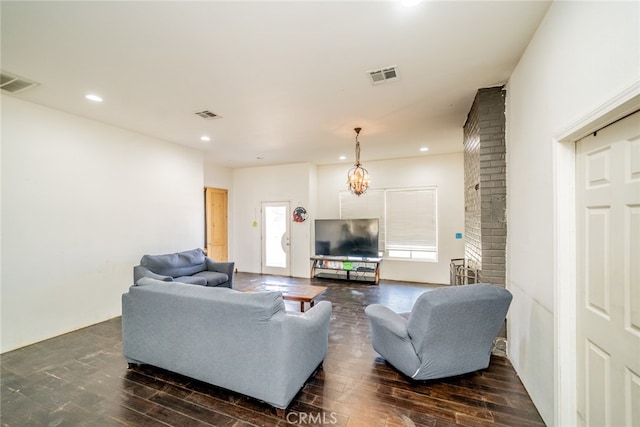 living room with dark hardwood / wood-style flooring