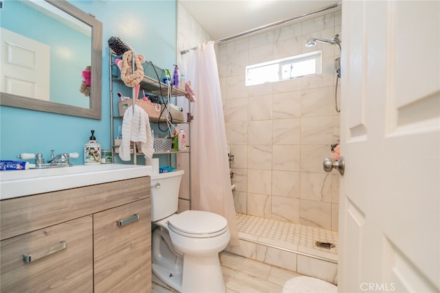 bathroom with walk in shower, vanity, toilet, and tile patterned floors