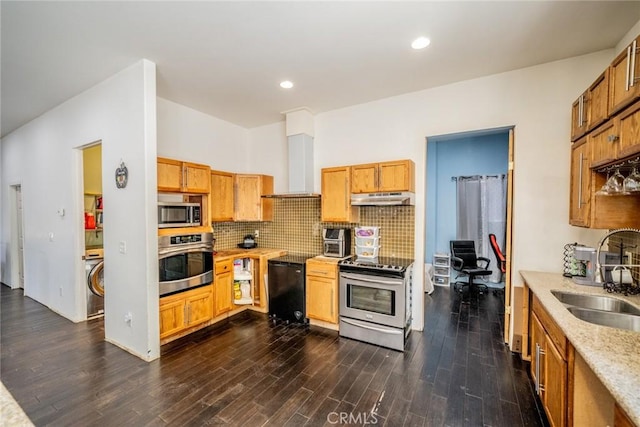 kitchen featuring under cabinet range hood, stainless steel appliances, a sink, decorative backsplash, and wall chimney exhaust hood