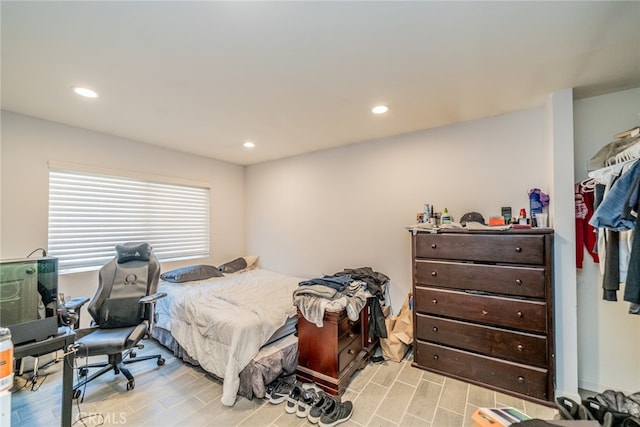 bedroom with light hardwood / wood-style flooring