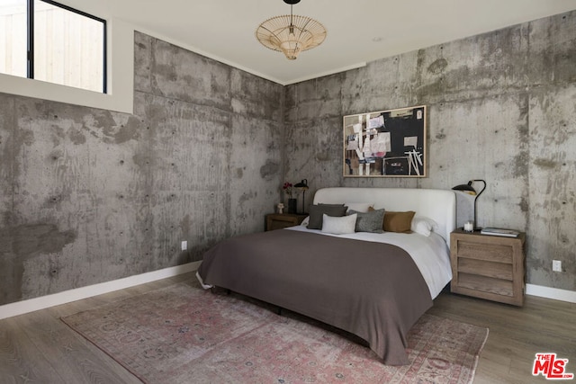 unfurnished bedroom featuring wood-type flooring