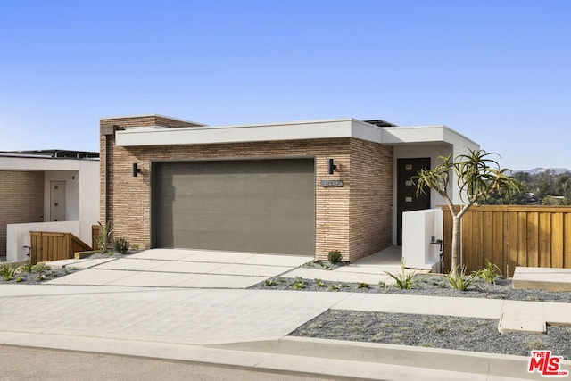 modern home featuring a garage