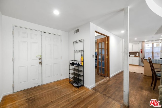 foyer featuring dark hardwood / wood-style flooring