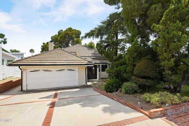 view of front of home with a garage