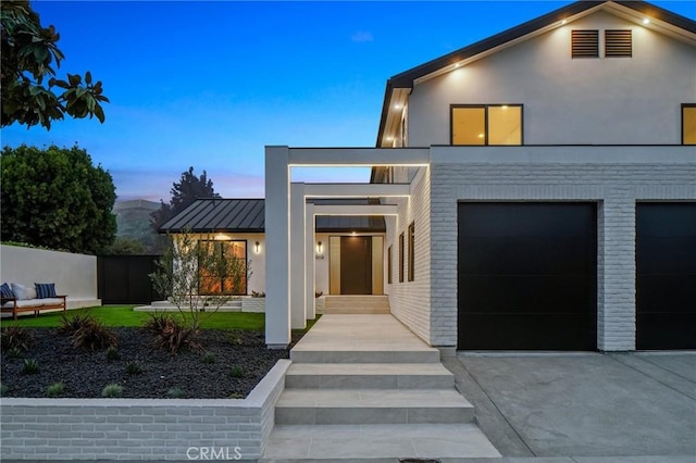 view of front of home with a garage