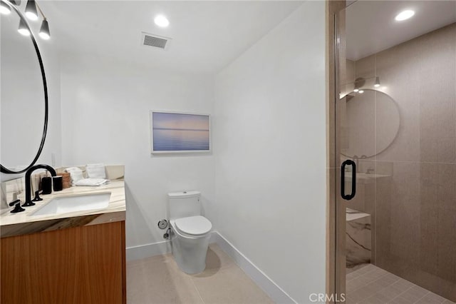 bathroom with tile patterned floors, walk in shower, toilet, and vanity