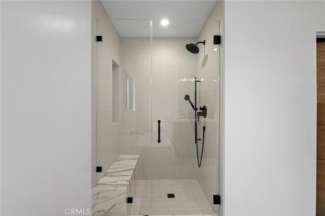 bathroom featuring walk in shower