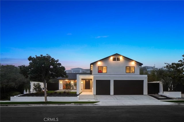 view of front of property featuring a garage