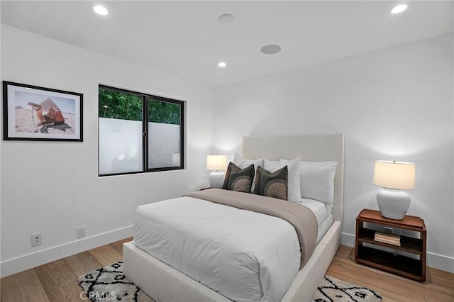 bedroom featuring light hardwood / wood-style flooring