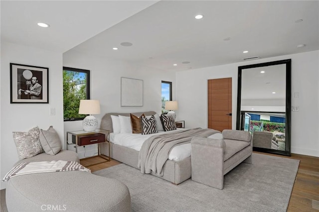 bedroom with light hardwood / wood-style floors