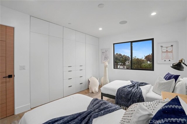 bedroom featuring light hardwood / wood-style flooring