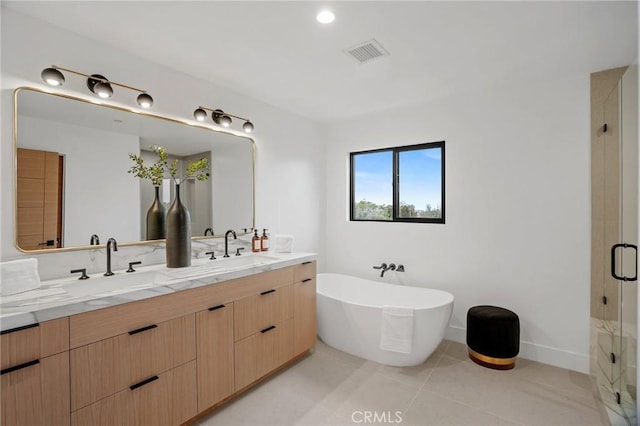 bathroom featuring vanity, separate shower and tub, and tile patterned flooring