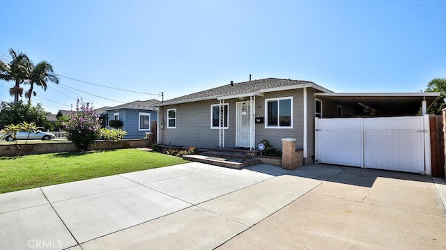 ranch-style home with a front lawn