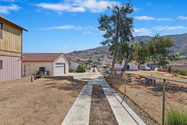 exterior space featuring a mountain view