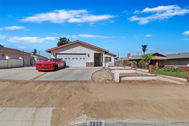 single story home featuring a garage