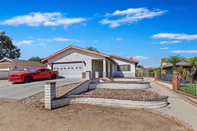 ranch-style house featuring a garage