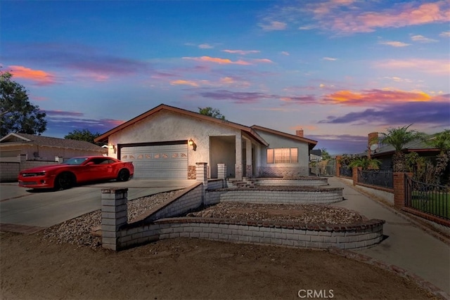 view of front of home featuring a garage