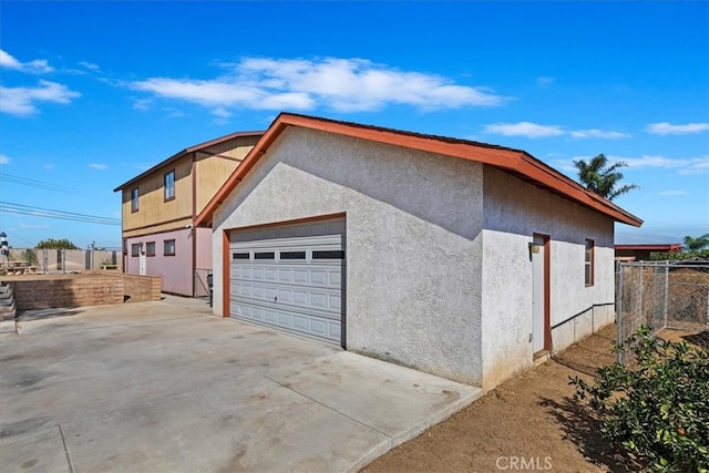 view of home's exterior with a garage