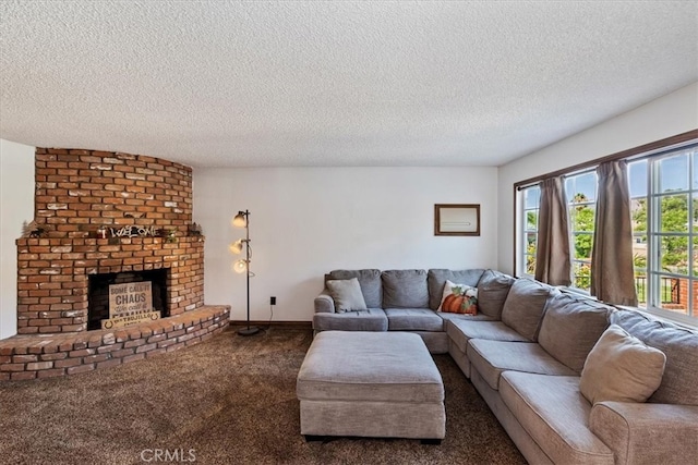 living room with dark carpet, a brick fireplace, and a textured ceiling