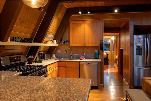 41959 Brownie Ln, Big Bear Lake, CA 92315 - kitchen featuring wooden ceiling, a sink, wooden walls, light wood finished floors, and stainless steel appliances
