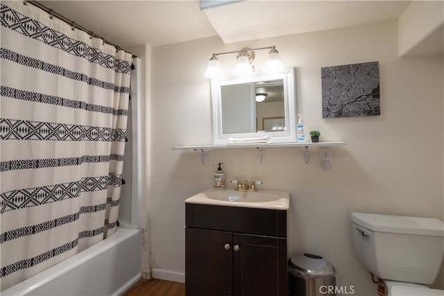 full bathroom featuring vanity, hardwood / wood-style floors, toilet, and shower / bathtub combination with curtain