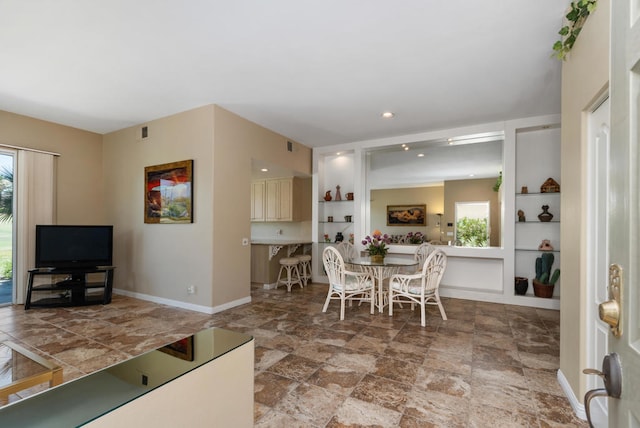 dining room featuring built in features