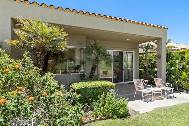 rear view of property with a patio