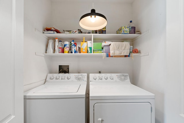 laundry room with washing machine and dryer