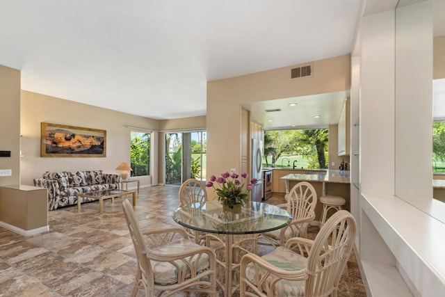 dining area featuring sink