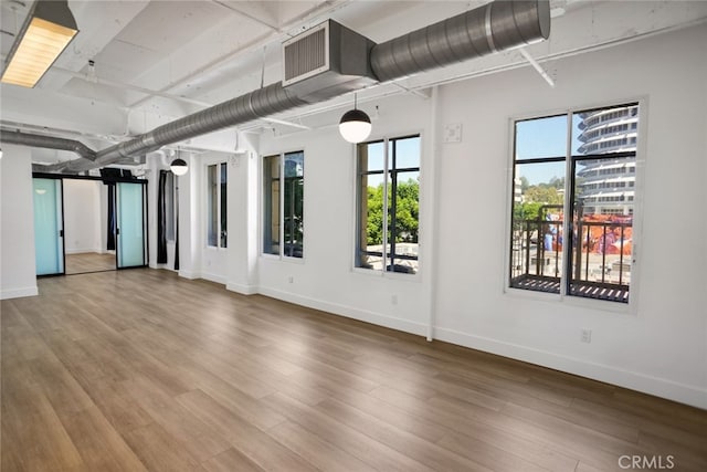 empty room with wood-type flooring