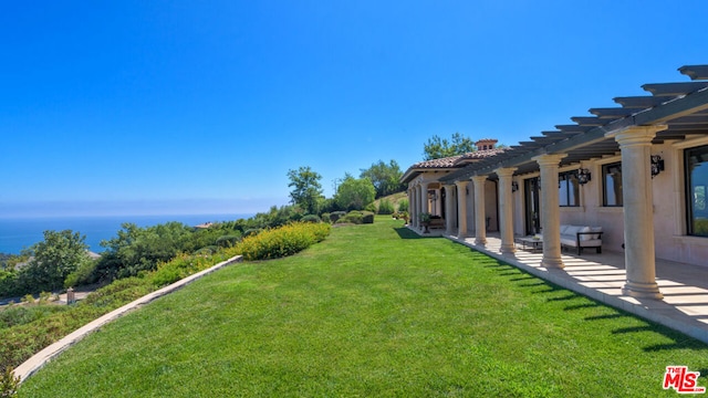 view of yard featuring a pergola and a patio area