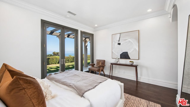 bedroom with access to outside, ornamental molding, dark wood-type flooring, and french doors