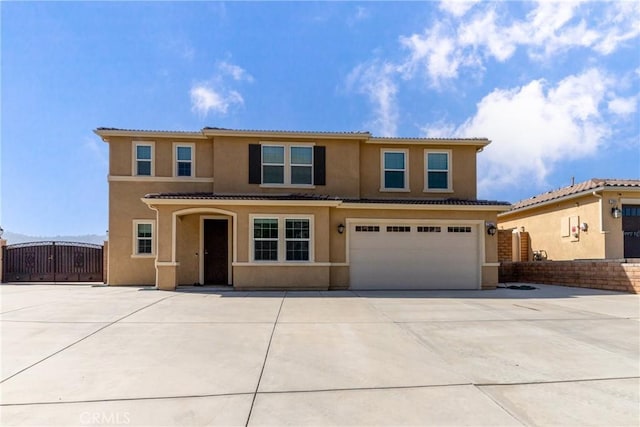 21047 Iron Rail Dr, Riverside, CA 92507 - traditional-style house with fence, stucco siding, driveway, and a garage