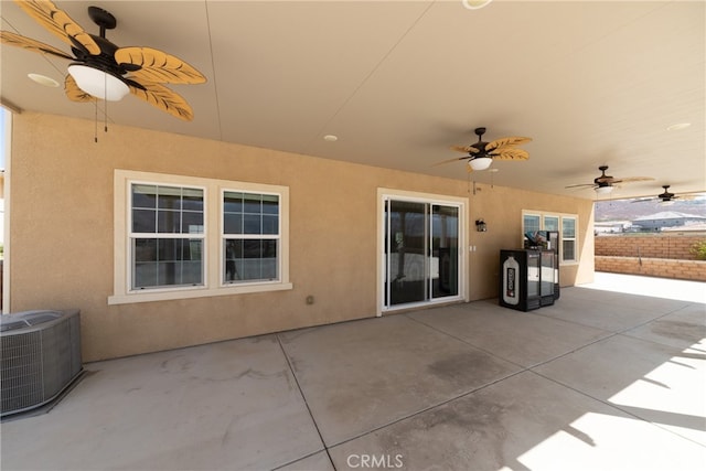 view of patio / terrace with ceiling fan and central AC unit