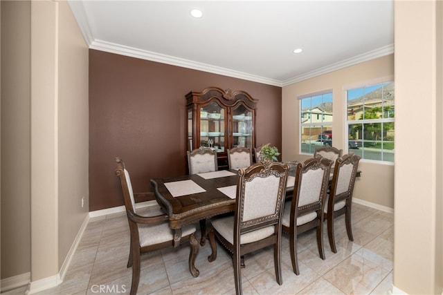 dining room with crown molding