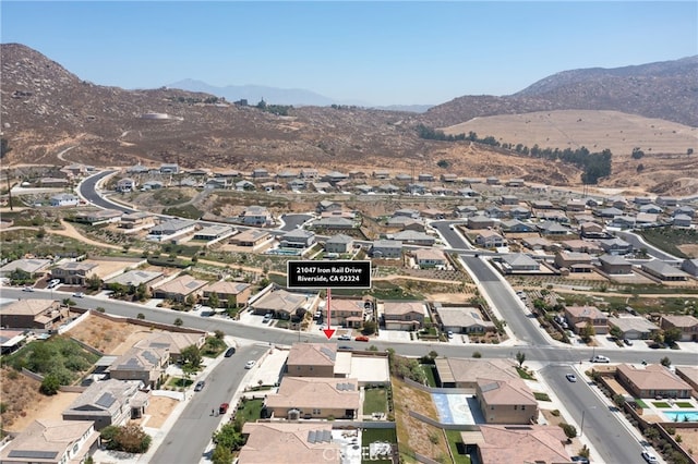 drone / aerial view featuring a mountain view