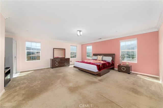 bedroom with carpet, multiple windows, and crown molding