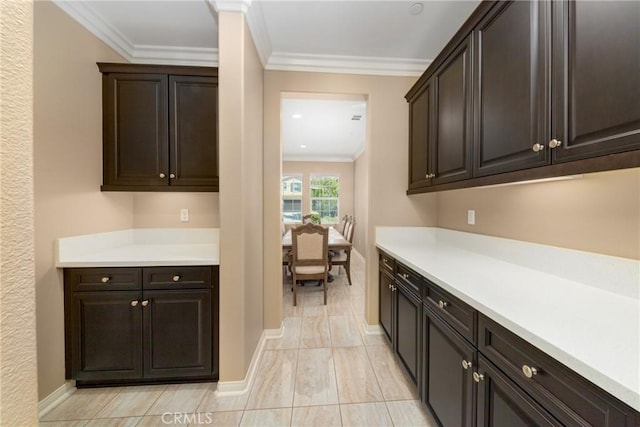 21047 Iron Rail Dr, Riverside, CA 92507 - bar featuring crown molding and baseboards