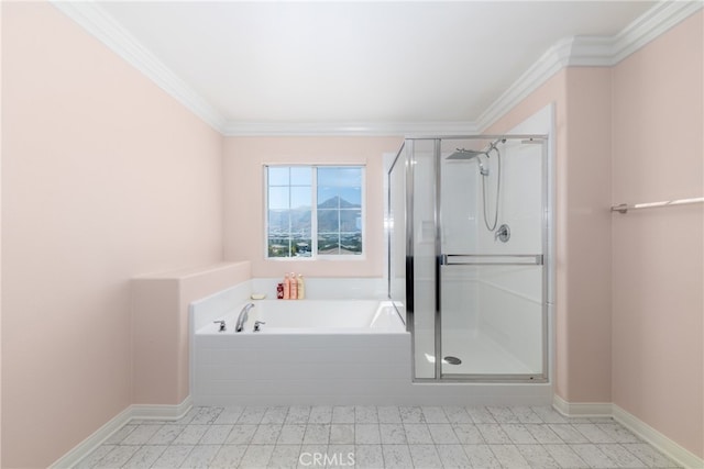 bathroom with crown molding and separate shower and tub