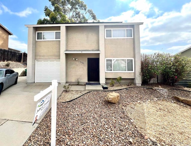 view of front of property featuring a garage