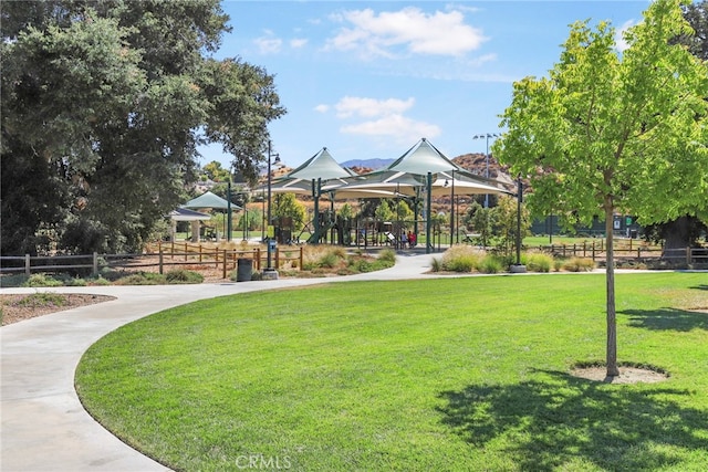 surrounding community featuring a yard and a gazebo