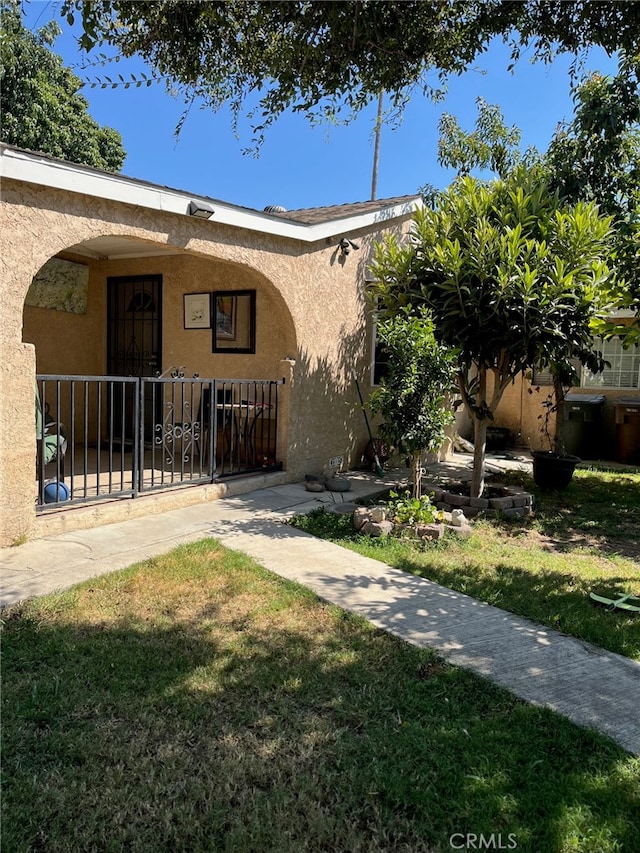 exterior space with a front lawn