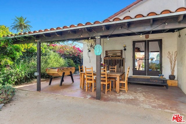 view of patio / terrace featuring french doors