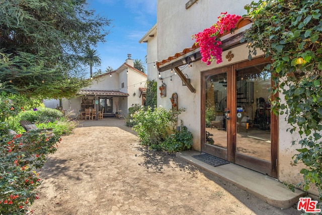 view of yard featuring french doors