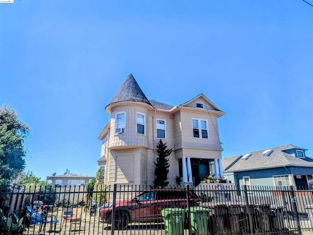 view of front of house with cooling unit