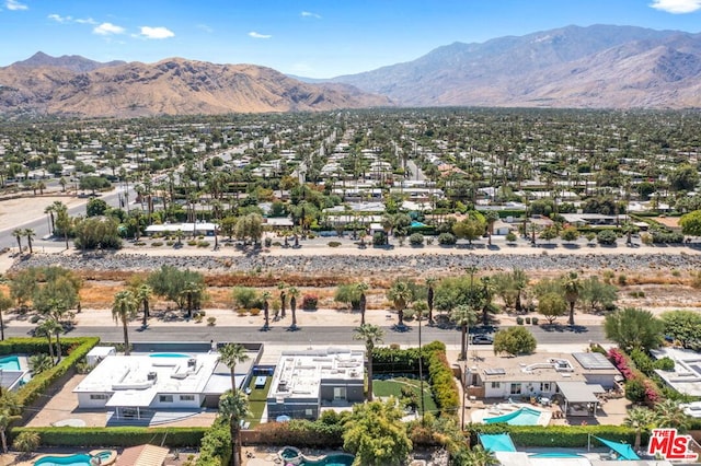 drone / aerial view featuring a mountain view