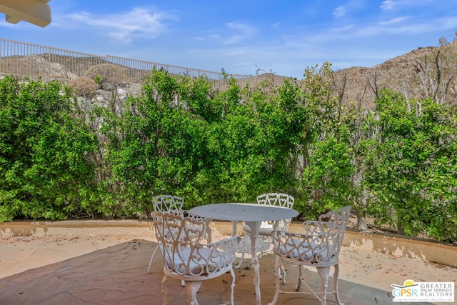 view of patio featuring a mountain view