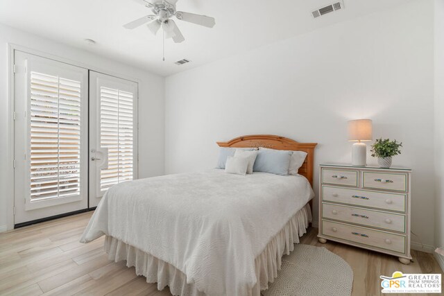 bedroom with light hardwood / wood-style floors, access to outside, and ceiling fan